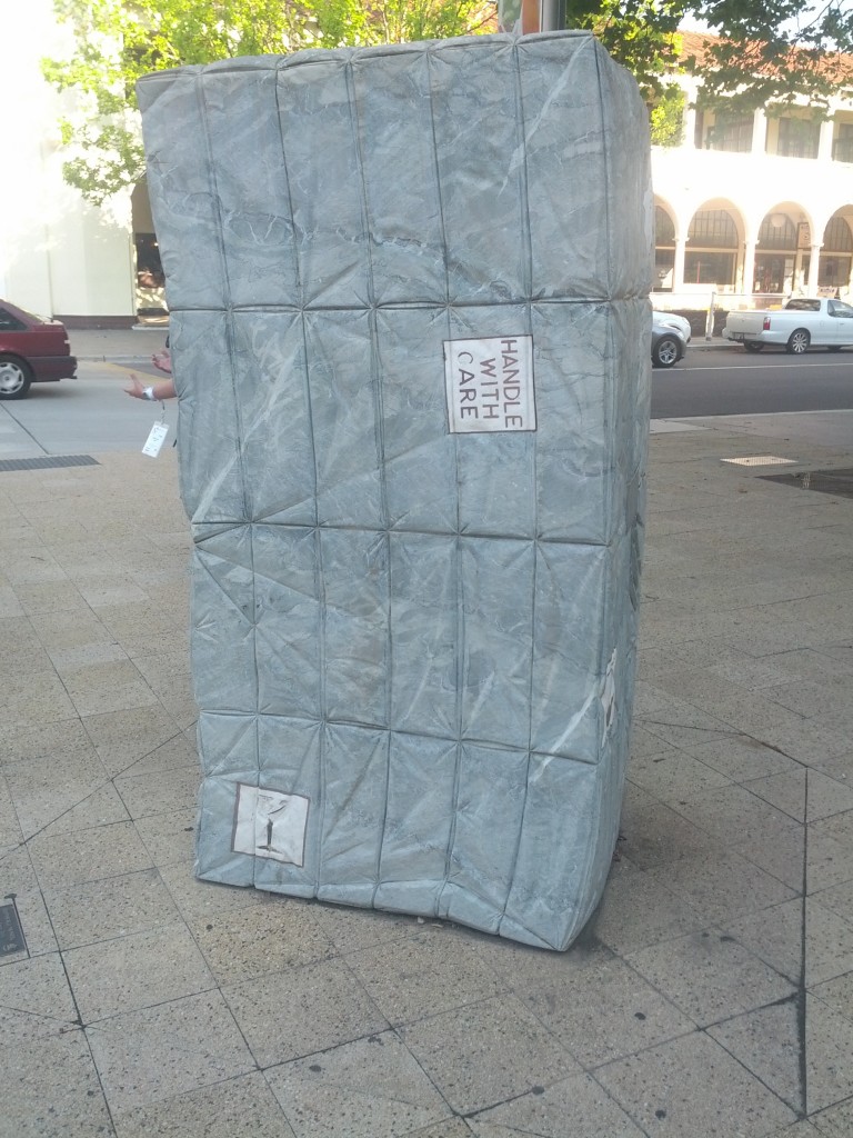 Either I've already had too many beers, or there's a giant stone parcel in my way.